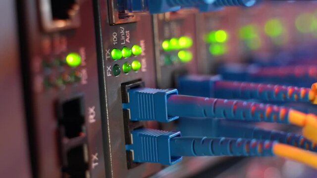 Fiber Optic cables connected to an optic ports