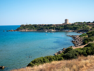 Fototapeta na wymiar Old Tower of Isola di Capo Rizzuto on the Ionian Sea, protected marine area of Capo Rizzuto. Crotone, Calabria, Italy.