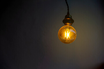 light bulb on dark background, concept of creativity.