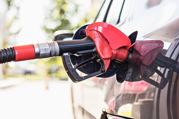  Refueling with gasoline using a gasoline pump car at a gas station