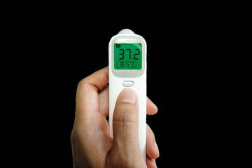 Medical electronic thermometer with high body temperature indicators,Check foreigners,Black background
