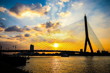 Fototapeta na wymiar Vibrance and saturated twilight of Rama 8 bridge, the famous landmark in Bangkok, Thailand