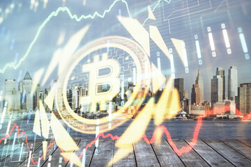 Double exposure of crypto currency theme hologram drawing and city veiw background. Concept of...