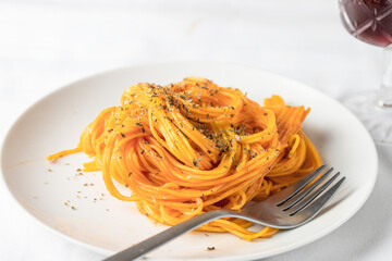 Spaghetti plate with oregano spice. Modern Italian food concept