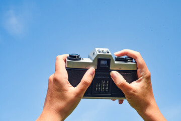 taking a photo on blue sky
