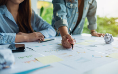 Group of businessman discussing and  working on financial paperwork in the office