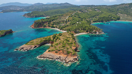 Aerial drone panoramic photo of paradise beaches in Kokinokastro with crystal clear turquoise sea, Alonissos island, Sporades, Greece 