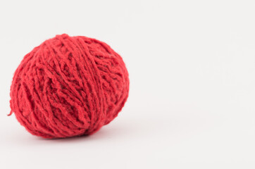 red wool thread  ball objects and materials still life