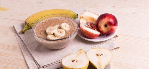a portion of morning granola porridge served on rustic wooden surface