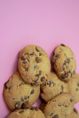 chocolate cookies on a pink background