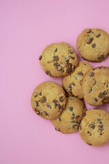 chocolate cookies on a pink background