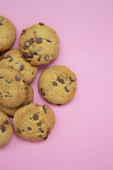 chocolate cookies on a pink background
