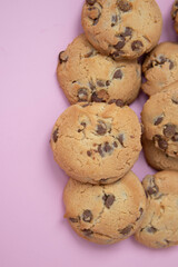 chocolate cookies on a pink background
