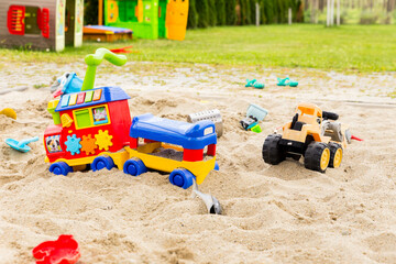 Yard sand playground with toys