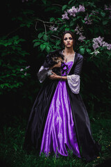 Obraz na płótnie Canvas Lady in black and purple baroque dress