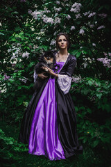 Fototapeta premium Lady in black and purple baroque dress