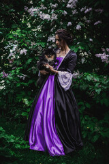 Fototapeta premium Lady in black and purple baroque dress