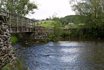 Fototapeta na wymiar Bridge over the river Brathay, in Little Langdale, Coniston, in the lake district, Cumbria, England.