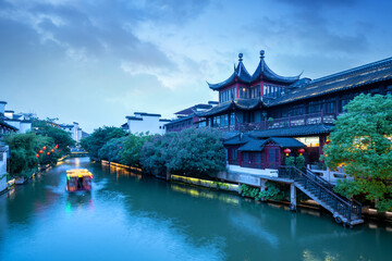 Fototapeta premium Nanjing Confucius Temple scenic region and Qinhuai River. People are visiting. Located in Nanjing City, Jiangsu Province, China.