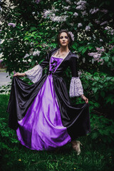 Lady in black and purple baroque dress