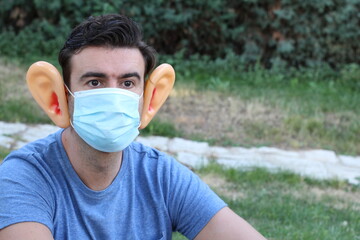 Man presenting discomfort in ears during pandemic 