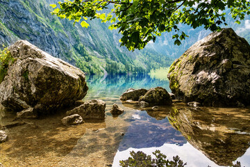 beautiful reflections on a lake in the bavarian alps
