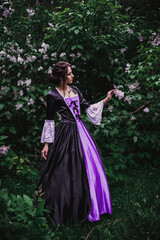 Lady in black and purple baroque dress