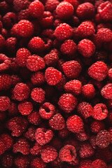 Lots of red ripe raspberries. Raw summer berries texture and background. Healthy food and vitamins concept.