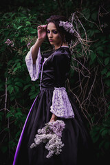 Lady in black and purple baroque dress