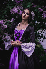 Lady in black and purple baroque dress