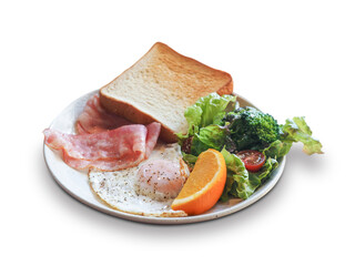 Traditional full English breakfast on a white plate with fried eggs, bacon, toasts, fresh salad and orange isolated.
