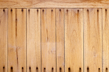 wooden wall with stain rust from old screws texture background