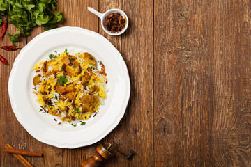 Biryani with chicken. Traditional Indian dish of rice and chicken marinated in spices and yoghurt.