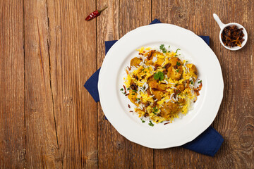 Biryani with chicken. Traditional Indian dish of rice and chicken marinated in spices and yoghurt.
