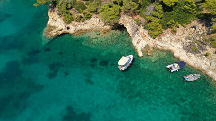 Aerial drone photo of famous small fishing port and village of Votsi in island of Alonissos, Sporades, Greece