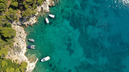 Aerial drone photo of famous small fishing port and village of Votsi in island of Alonissos, Sporades, Greece