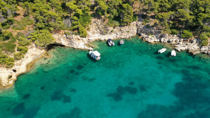 Aerial drone photo of famous small fishing port and village of Votsi in island of Alonissos, Sporades, Greece
