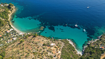 Fototapeta na wymiar Aerial drone photo of famous turquoise beach of Mourtias in island of Alonissos, Sporades, Greece