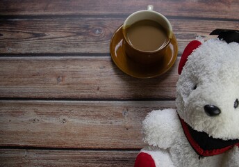 cup of coffee with teddy bear