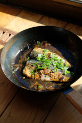 Japanese Fish fillet cooked with sweet soy sauce and spring onion. Teriyaki style fish.
