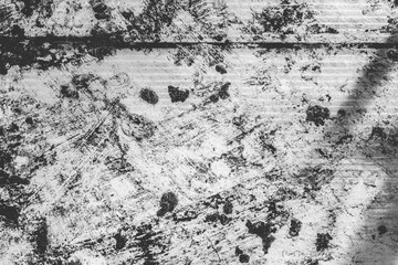 Abstract monochrome background with scratches, lines and paint spots.