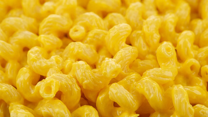 pasta amorosi with cheddar cheese sauce close up