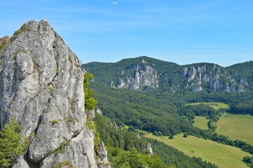 Fototapeta na wymiar Beautiful Sulov rocks with forrests around during the summer in national nature reserve Sulov rocks in Slovakia