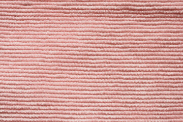 Pink fabric cloth texture background close up