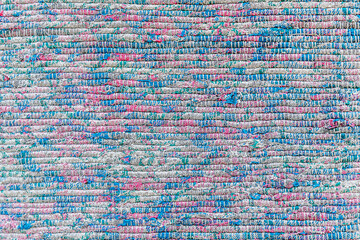 abstract background of an old motley cotton fabric close up