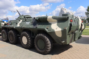 Fototapeta premium military trucks with army at Minsk street