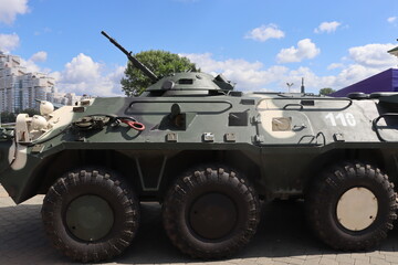 Fototapeta premium military trucks with army at Minsk street