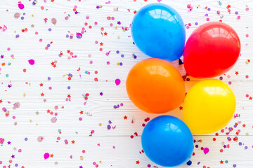 Flat lay with ballons - party concept - on white background top-down copy space