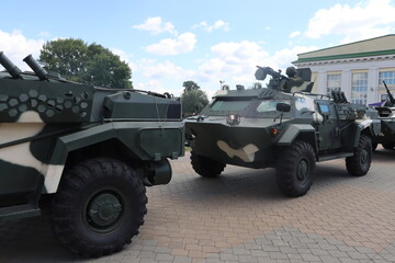 Fototapeta premium military trucks with army at Minsk street