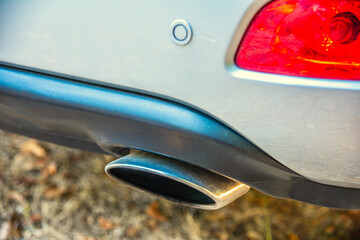 Right exhaust chromed pipe of a mondern SUV